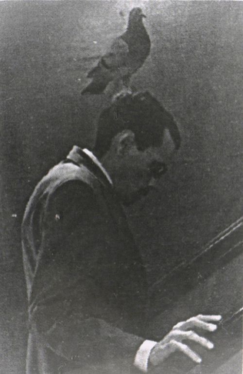 The spy with his spy-pigeon during the mission, 1949 The spy with his spy-pigeon during the mission, 1949